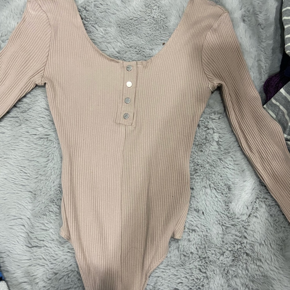 Nude Bodysuit with buttons. Long sleeve